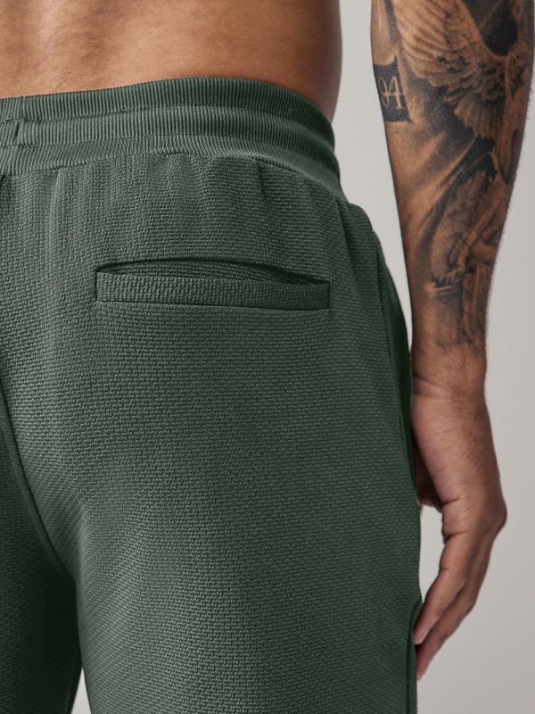 XINQTRADE72355 Khaki Green Active Gym Training Joggers - Image 3