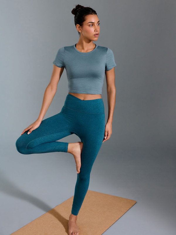 XINQTRADE72381 Blue Yoga Sports Short Sleeve Top with Open Back - Image 4